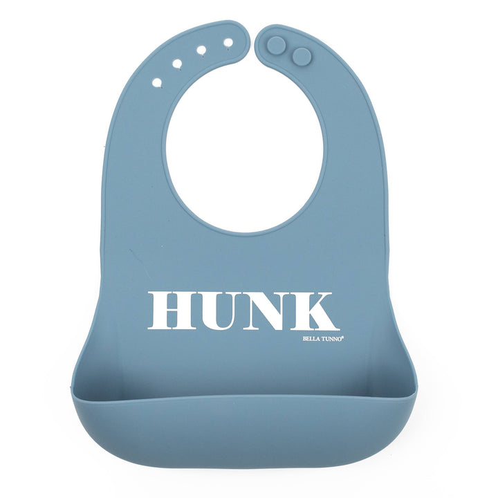 Baby wearing a Bella Tunno Hunk Wonder Bib, soft and colorful baby bib with adjustable straps for feeding and teething.