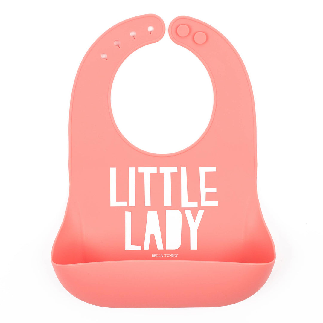 Pink baby bib from Bella Tunno Little Lady Wonder Bib with cute ladybug design, soft fabric, and adjustable neck strap.