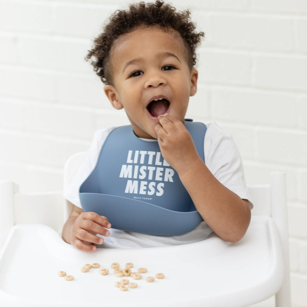 Bella Tunno Little Mister Mess Wonder Bib in soft fabric with playful design, perfect for catching spills during mealtime.