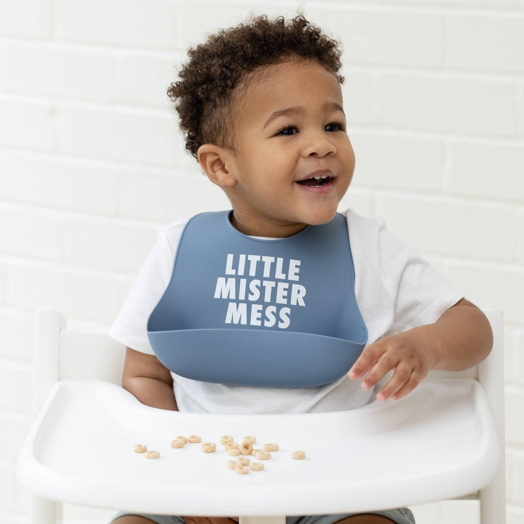 Bella Tunno Little Mister Mess Wonder Bib with colorful design, waterproof fabric, and adjustable neck for baby feeding protection.
