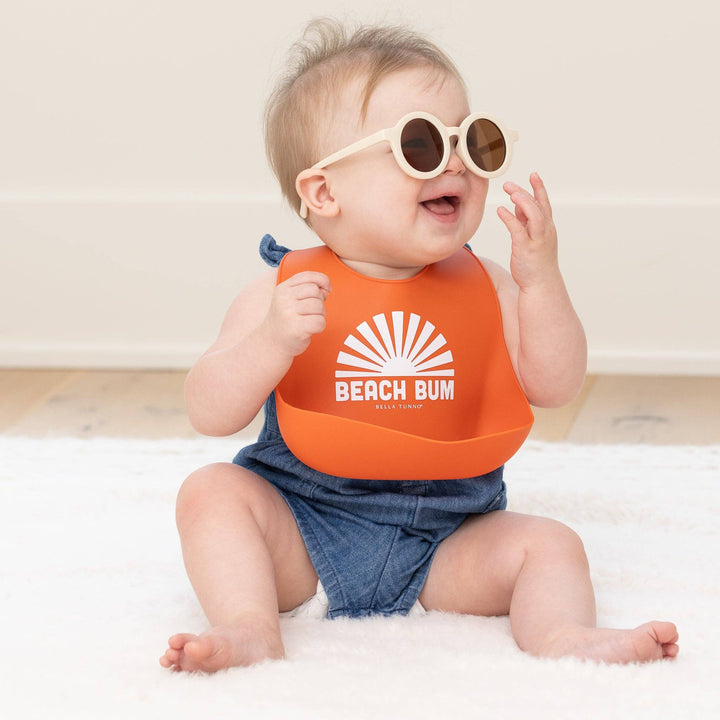 Bella Tunno Beach Bum Wonder Bib, soft and durable baby gift bib with fun beach-themed design for feeding protection.