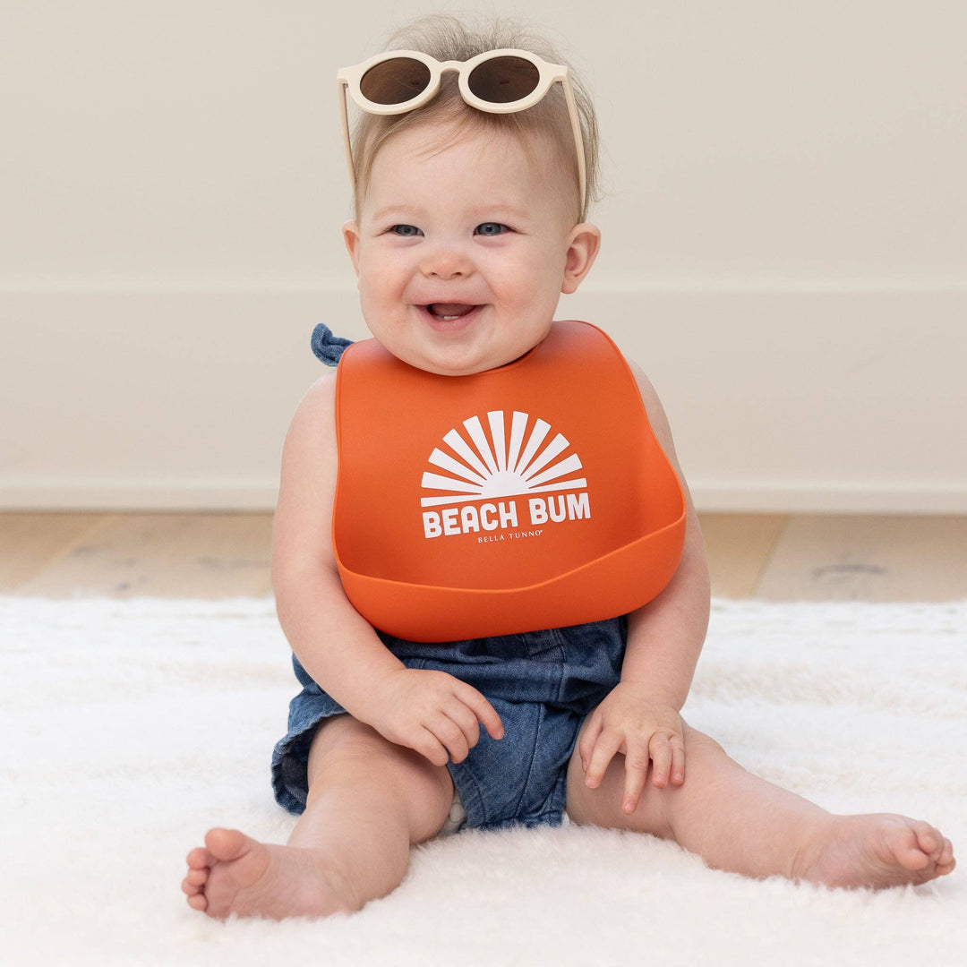 Bella Tunno Beach Bum Wonder Bib, soft and colorful baby bib with fun beach-themed design for feeding and mealtime.
