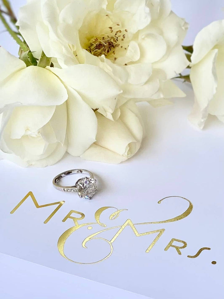 Gold foil Mr. & Mrs. notepad by Black Ink featuring elegant design, perfect for wedding or gift use.