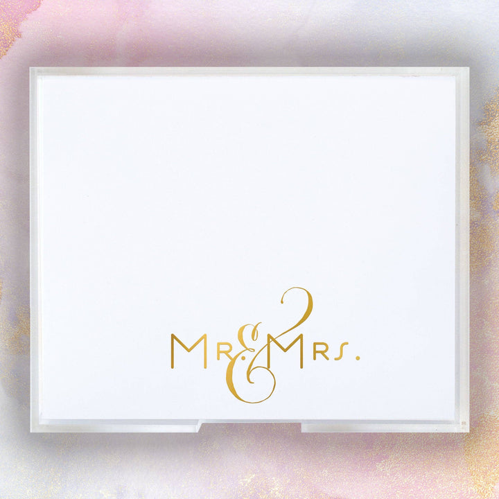 Gold foil Mr. & Mrs. notepad from Black Ink gifts featuring elegant design for wedding or couple note-taking.