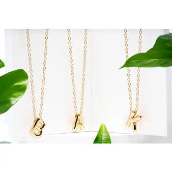 Cai Bold Bubble Initial Necklace with large, round bubble charms in gold tone, stylish accessories for personalized jewelry look.