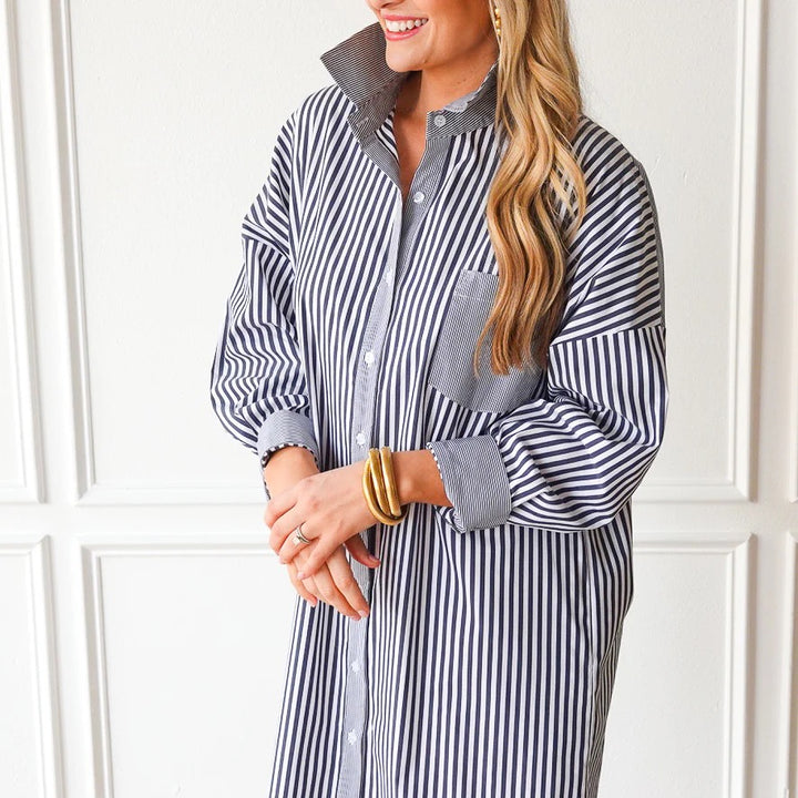 Caryn Lawn Francis Dress in charcoal with white stripe pattern, stylish women's dress showing a fitted silhouette and elegant design.