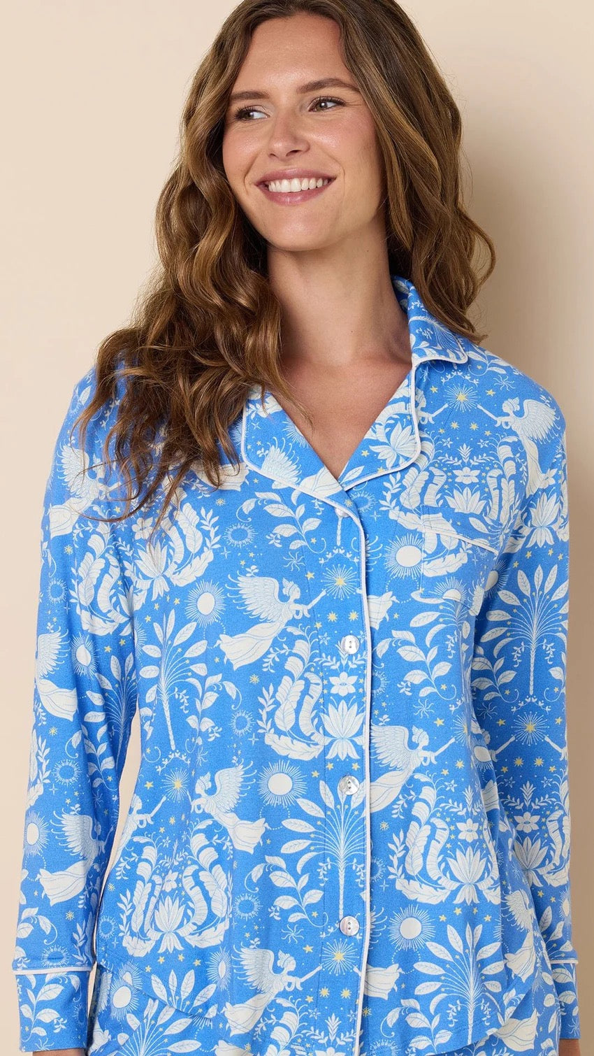 Blue Angels pajama loungewear set by cat's pajamas featuring a blue and white angel wing pattern on soft fabric.