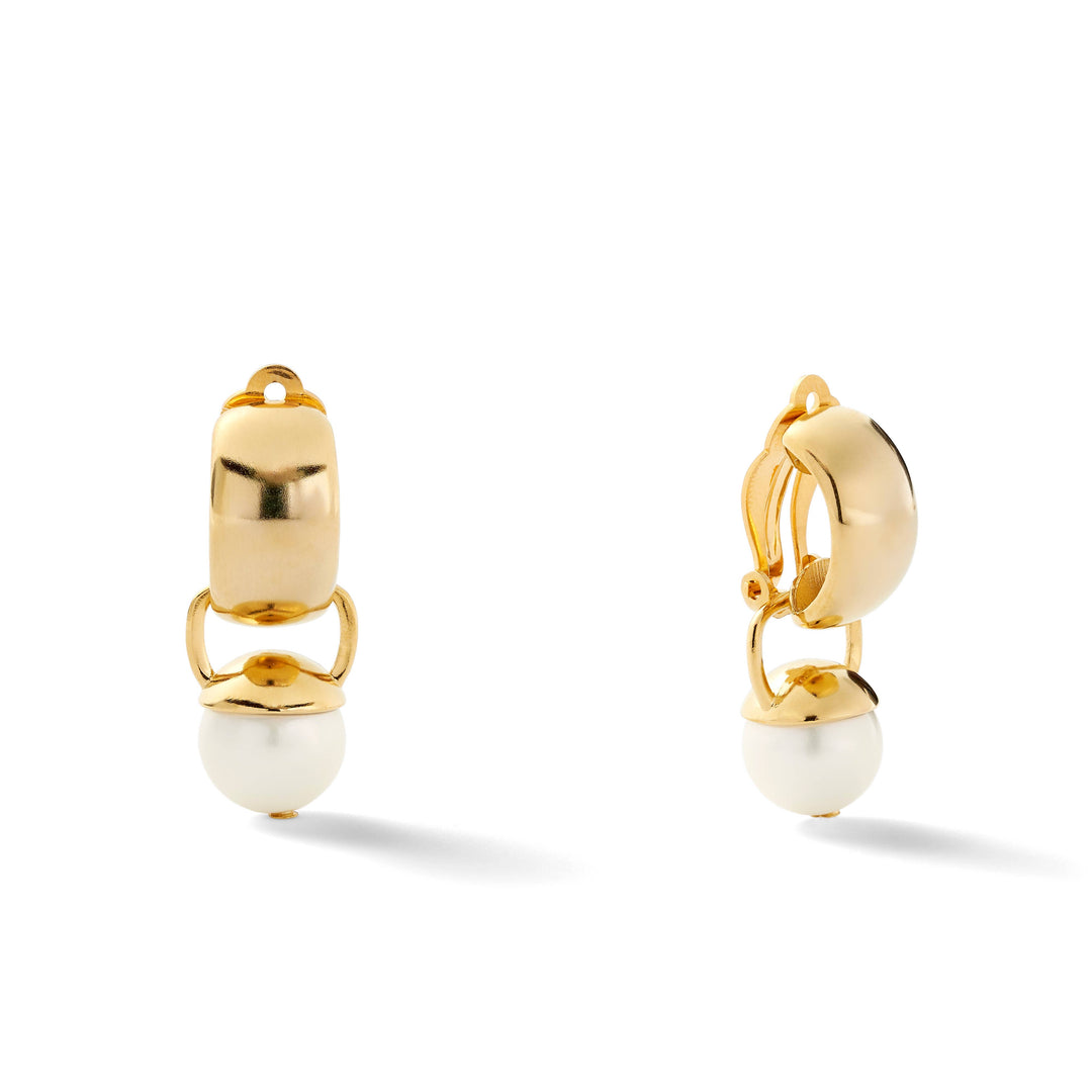 Catherine Canino hoop and pearl charm earrings featuring silver hoops with dangling pearl charms, stylish accessories for elegant looks.