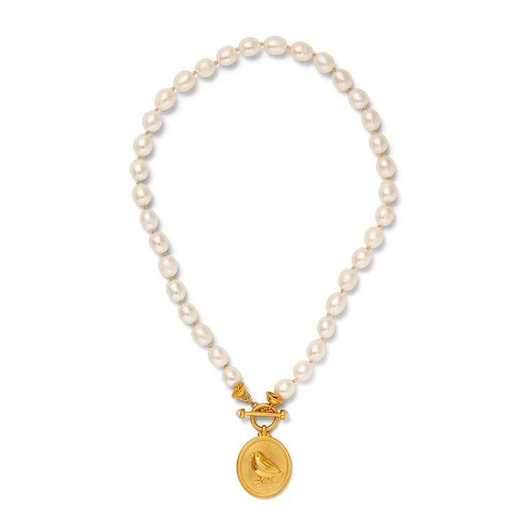 Catherine Canino Little Freshwater Bird Necklace with delicate silver chain and small bird pendant, perfect as a charming accessories piece.