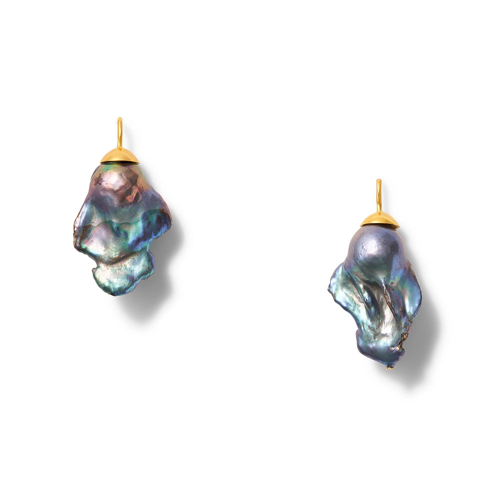 Big Baroque Pearl Earring by Catherine Canino with a large, irregularly shaped pearl and elegant gold setting.