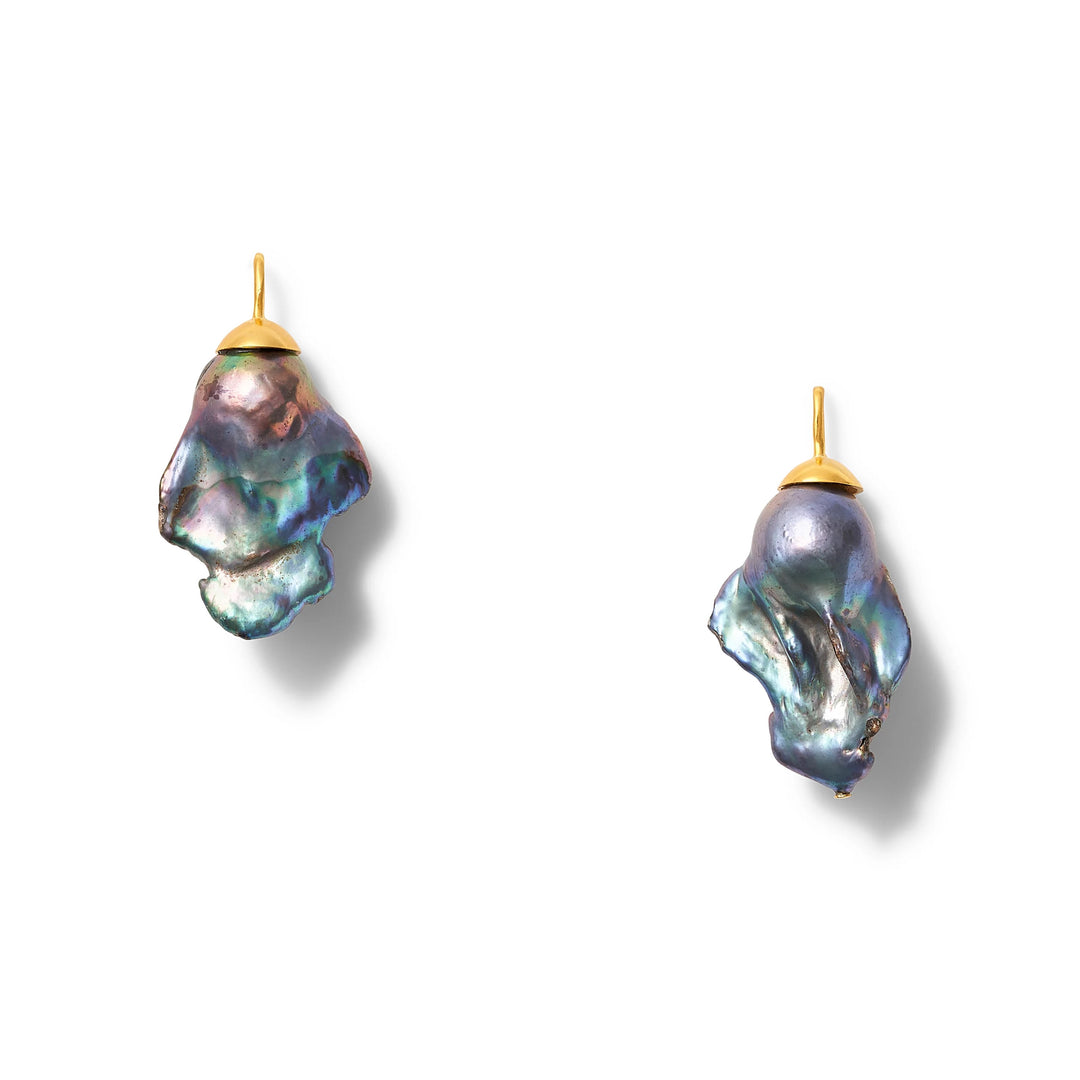 Big Baroque Pearl Earring by Catherine Canino with a large, irregularly shaped pearl and elegant gold setting.