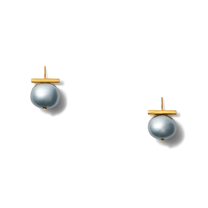Catherine Canino Pebble Medium Pearl Earring showing a round pearl with a smooth surface and elegant design.