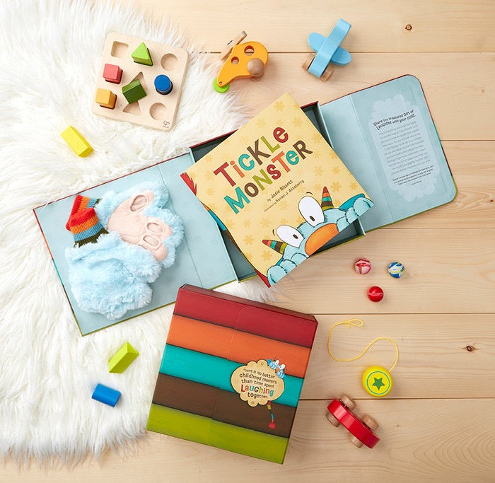 Baby Tickle Monster set by Compendium featuring soft, colorful plush monster toys for infants' playful sensory fun.