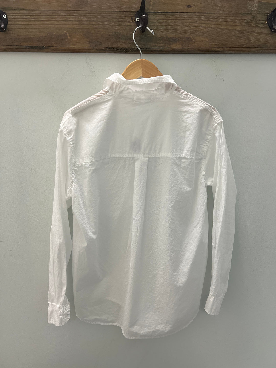 Cpshades white cotton blouse, stylish tops with a relaxed fit and classic collar, displayed on a hanger.