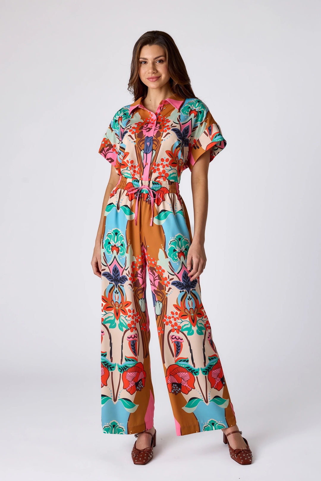 Crosby by Mollie Burch Ziggy Art Nouveau pant, stylish bottoms with intricate pattern, shown in a side view image.