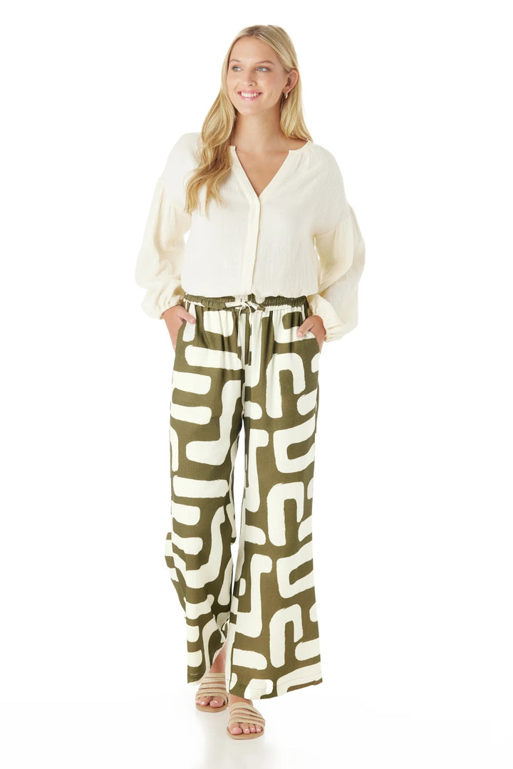 Crosby by Mollie Burch Ziggy pant in stylish bottoms, featuring a tailored fit and vibrant pattern, shown on a model.