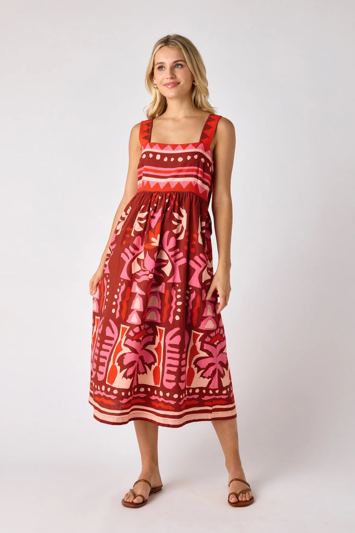 Crosby by Mollie Burch Simpkin dress in Mexico City style, featuring lightweight fabric and relaxed fit, displayed on a hanger.