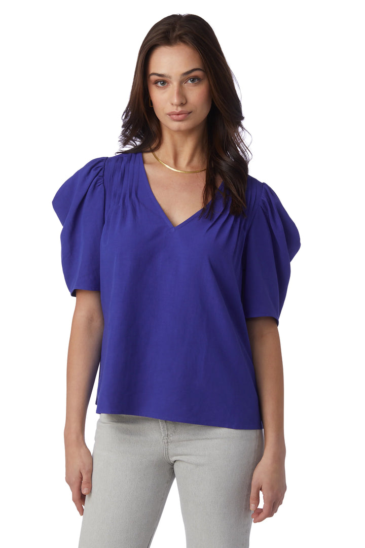 Crosby by Mollie Burch Stetson Top featuring a relaxed fit, soft fabric, and stylish design, shown in a casual setting.