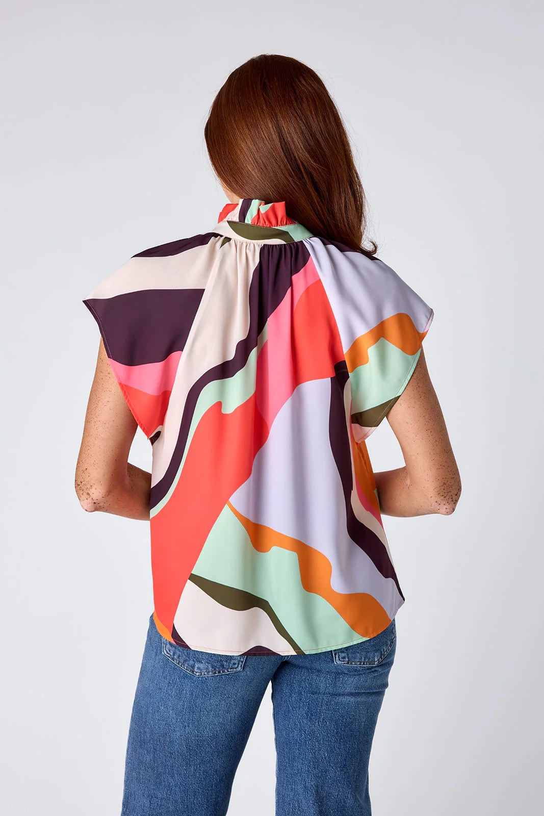 Crosby by Mollie Burch Billie Rocky Top in vibrant fabric, featuring a stylish sleeveless design with ruffled details.