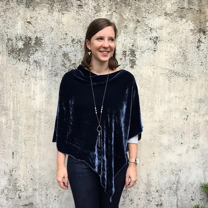 Silk velvet poncho from Dana Herbert Designs, showcasing a luxurious, flowing clothing piece with rich fabric and elegant drape.