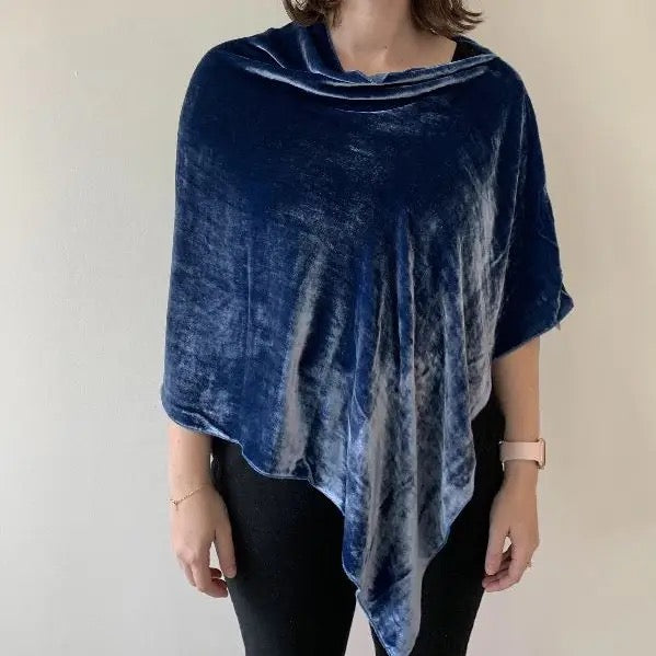 Silk velvet poncho from Dana Herbert Designs, showcasing a luxurious, soft fabric draped elegantly over a neutral background.