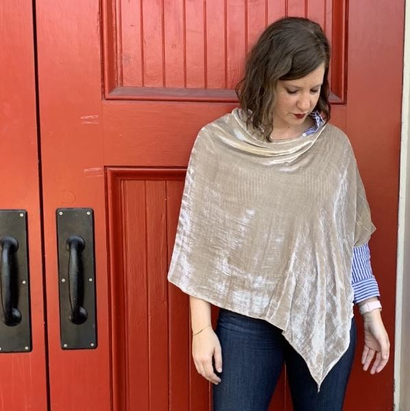 Silk velvet poncho by Dana Herbert Designs featuring a flowing, luxurious fabric with a stylish drape and elegant neckline.