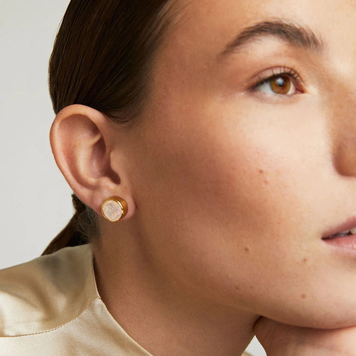 Large Signature Knockout Stud Earring by deaN Davidson, close-up of the bold, silver-toned stud accessory with geometric design.