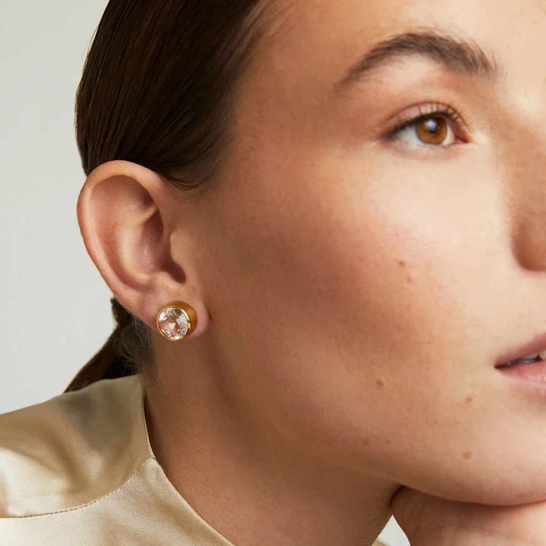 Large Signature Knockout Stud Earring by deaN Davidson, close-up of the bold, metallic accessory with a polished finish.
