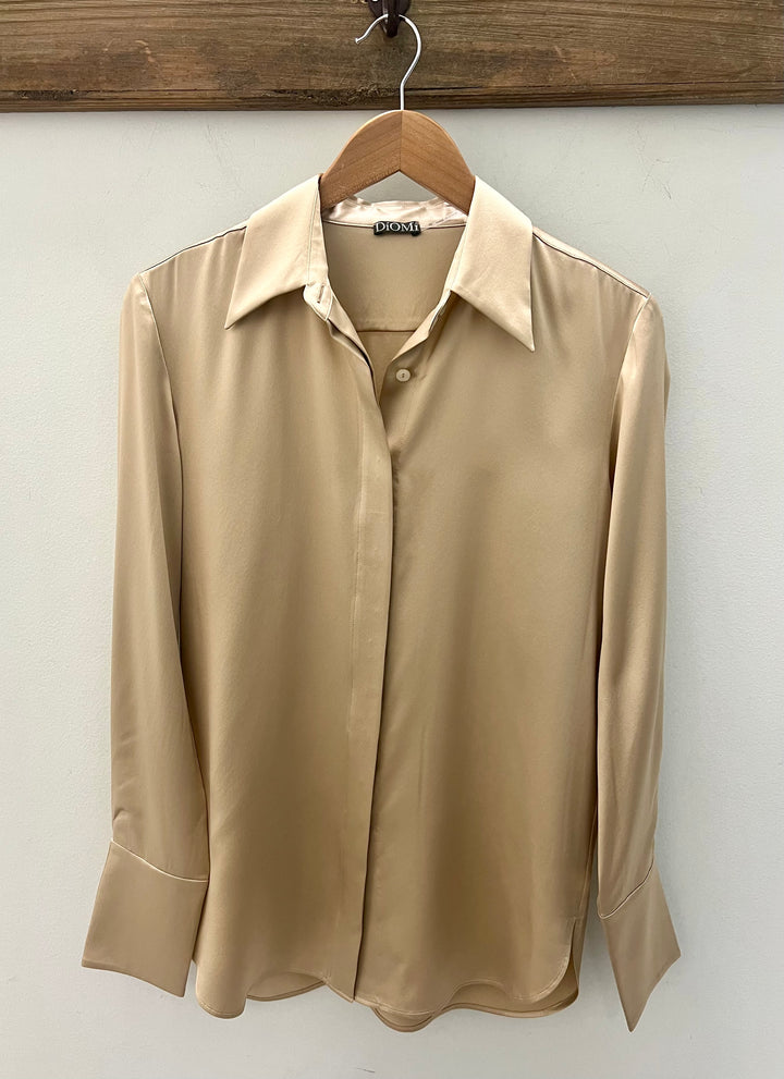 Diomi silk sateen buttondown blouse in a soft, elegant fabric with a classic collar and button front, displayed on a hanger.