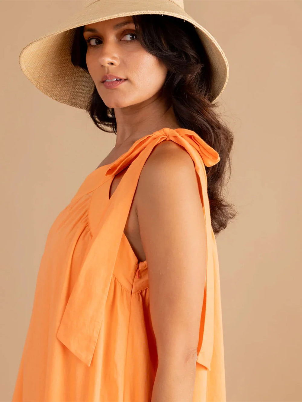 Double A Juliette Dress in vibrant melon color, featuring a stylish and comfortable design, perfect for casual or semi-formal wear.