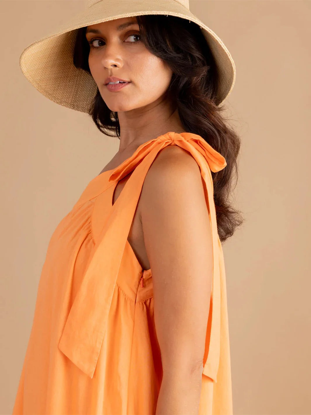 Double A Juliette Dress in vibrant melon color, featuring a stylish and comfortable design, perfect for casual or semi-formal wear.