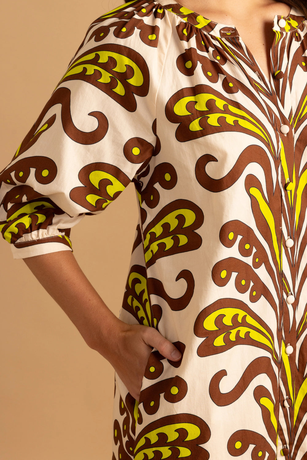 Double A Madeleine Ornament Midi Dress showing a stylish, patterned dress with a fitted waist and flowing skirt.