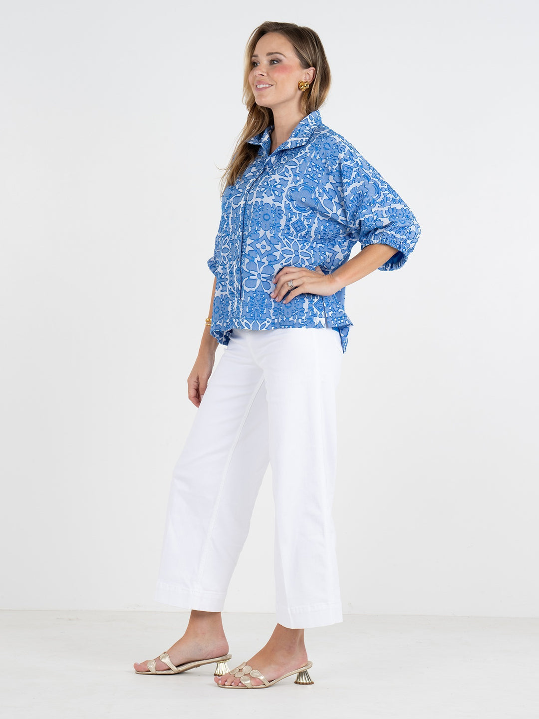 Emily McCarthy Bonny Positano top, stylish women's blouse with vibrant floral pattern and short sleeves, perfect for summer wear.