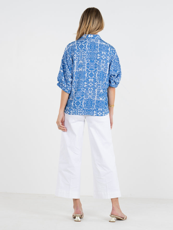 Emily McCarthy Bonny Positano top, stylish women's blouse with floral pattern, long sleeves, and relaxed fit.