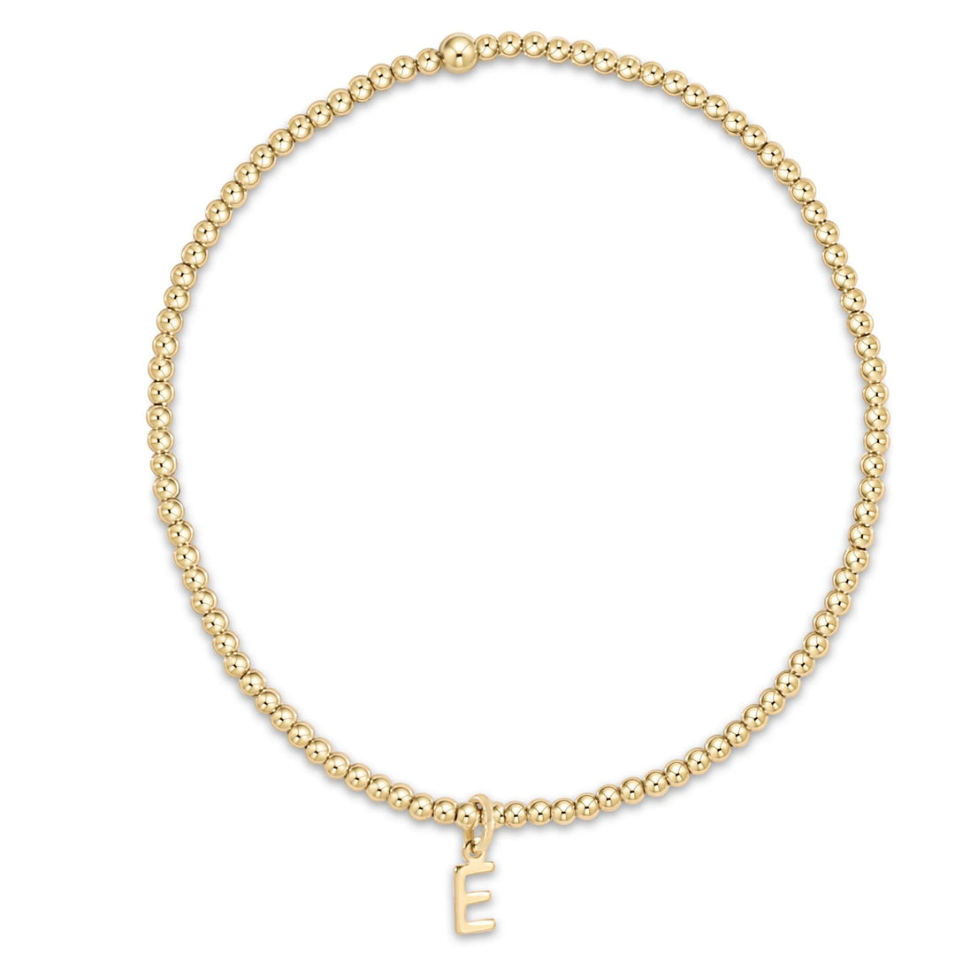 Enewton Classic Gold 2MM Bead Respect Initial Gold Bracelet with gold beads and initial charm on a delicate chain.