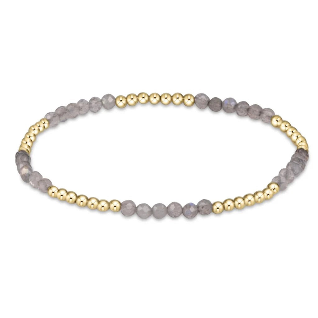 Enewton Blissful Pattern 2.5mm gold bead gemstone bracelet with intricate design and vibrant gemstones on a delicate chain.