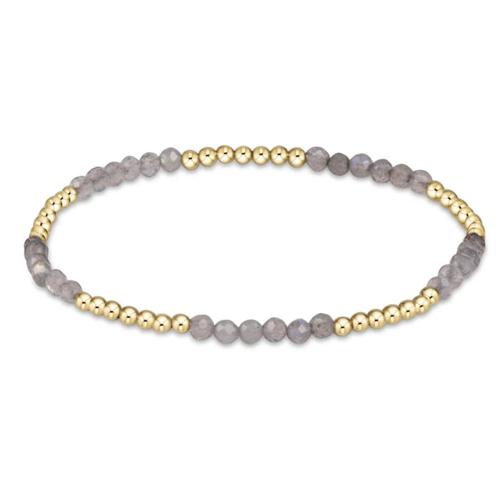 Enewton Blissful Pattern 2.5mm gold bead gemstone bracelet with intricate design and vibrant gemstones on a delicate chain.
