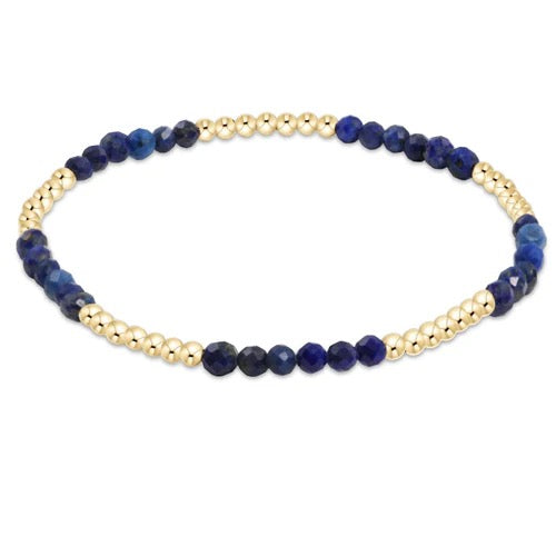 Enewton Blissful Pattern 2.5mm gold beaded gemstone bracelet with intricate design, showcasing elegant gold beads and vibrant gemstones.