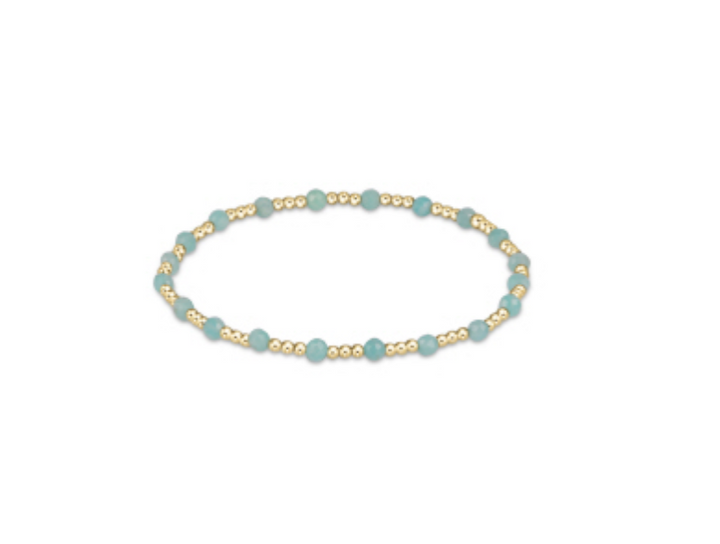 Enewton gemstone gold sincerity pattern 3mm bead bracelet featuring gold and colorful gemstone beads on a delicate bracelet.