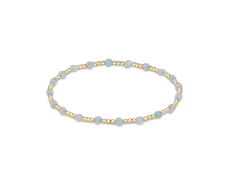 Enewton gemstone gold sincerity pattern 3mm bead bracelet with gold accents, showcasing a delicate and elegant accessory design.