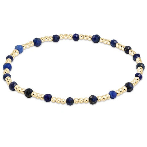 Enewton gemstone gold sincerity pattern 3mm bead bracelet with colorful gemstone beads and gold accents on a neutral background