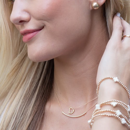 Enewton 16-inch gold Bliss Bar necklace featuring a sleek, minimalist design on a delicate chain accessory.