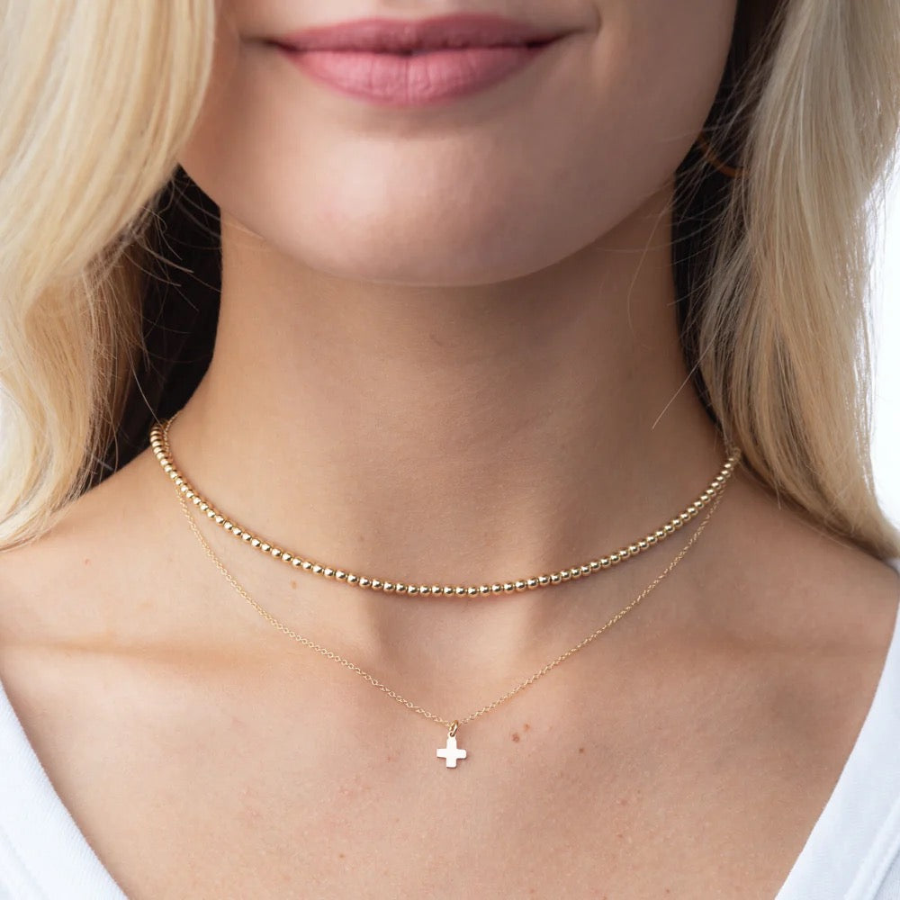 Enewton 17-inch gold choker necklace with 3mm bead design, close-up of the classic jewelry accessory on a plain background.