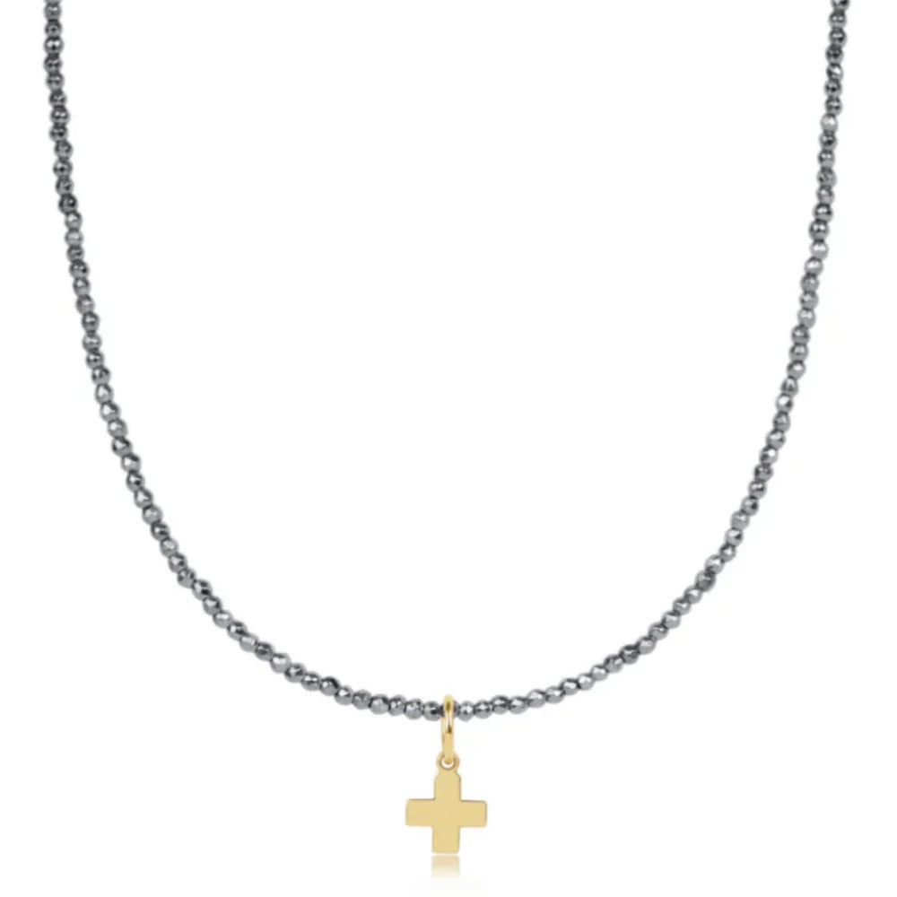 17-inch silver hematite choker necklace with a gold signature cross charm and 2mm faceted hematite beads.