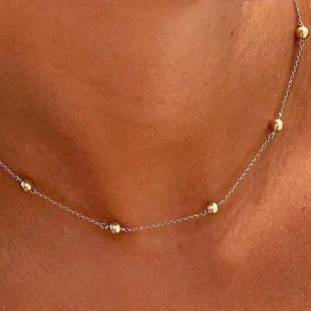 Gold 17-inch choker necklace with a simple 4mm chain from Enewton, showcasing its elegant classic design.