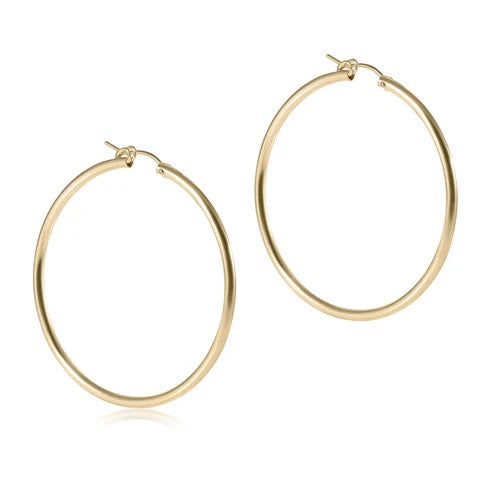 Gold 2-inch round smooth post hoop earrings from Enewton, featuring sleek, polished gold hoops with a secure post back.