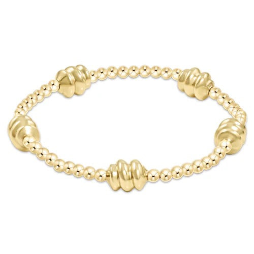 Enewton Admire Gold 3mm bead bracelet with gold-toned beads, stylish accessory for everyday or special occasions.