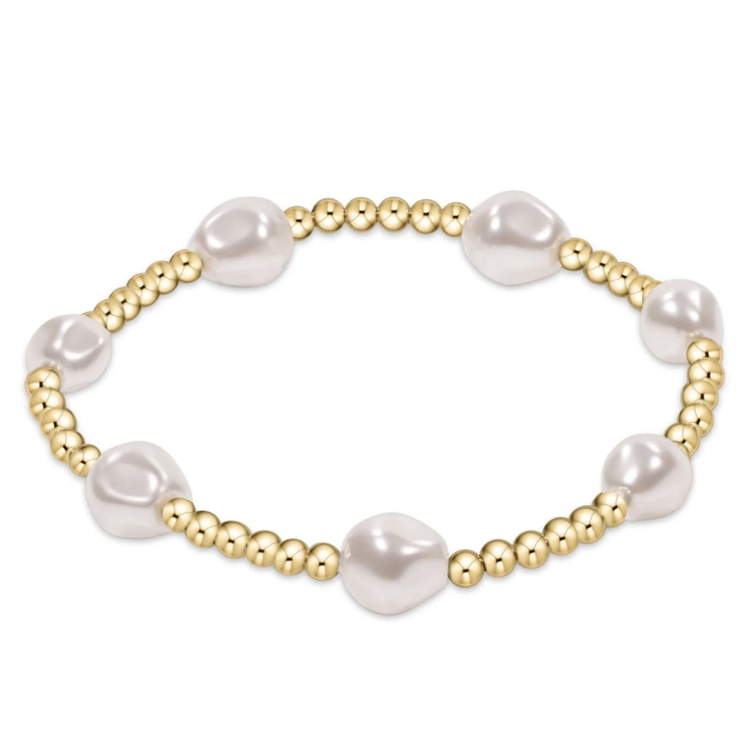 Enewton Admire Pearl 3mm bead bracelet in gold, featuring elegant pearl beads on a stylish jewelry accessory.