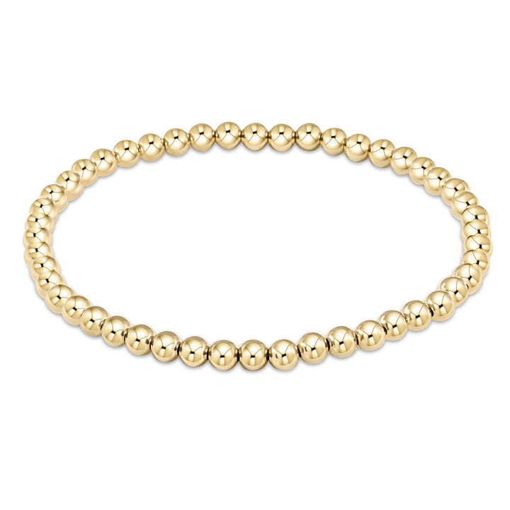 Enewton Classic Gold 4mm Bead Bracelet featuring round gold beads on a delicate string, stylish accessories for any occasion.