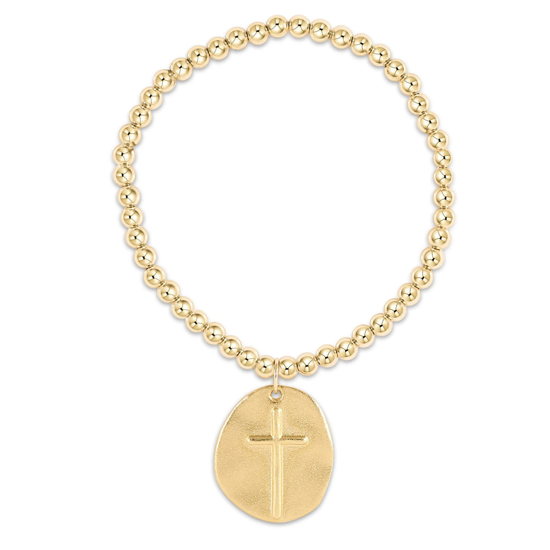Enewton Classic Gold 4mm Bead Bracelet with Inspire charm, featuring gold beads and a decorative charm for stylish accessories.